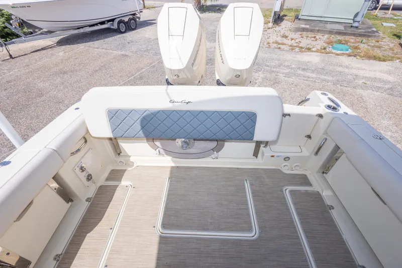 Slide: The Image of 2023 Chris-Craft Catalina 30 boat interior with dual outboard motors. - 52