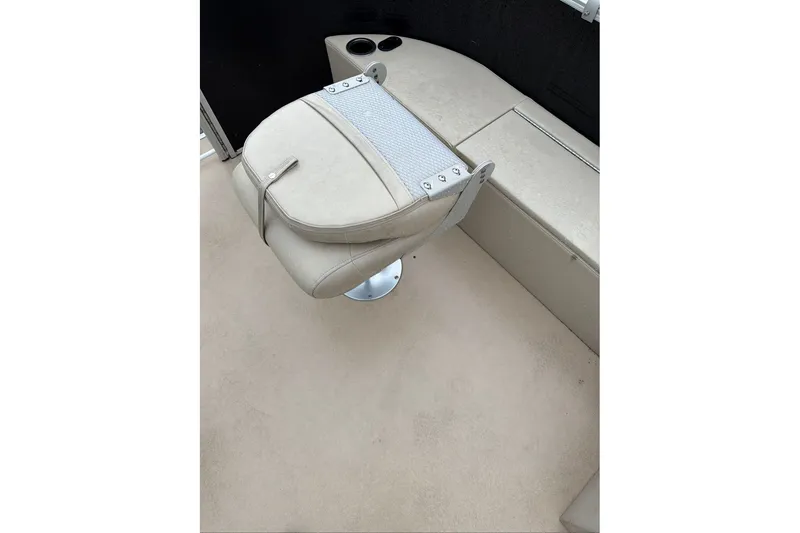 Slide: The Image of Beige seating on 2016 Godfrey Sweetwater 2286 boat, featuring cup holders and sleek design. - 8