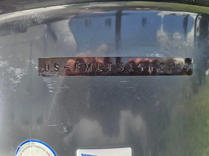 Slide: The Image of Close-up of a hull identification number on a 2014 Ranger Tugs 31-CB boat. - 10