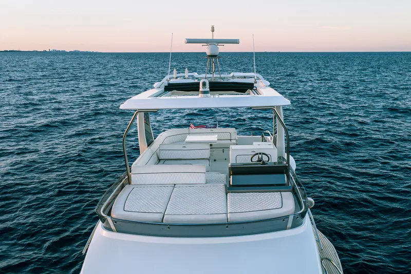 Slide: The Image of Luxurious 2021 Galeon 500 Fly yacht cruising on open sea at sunset. - 18