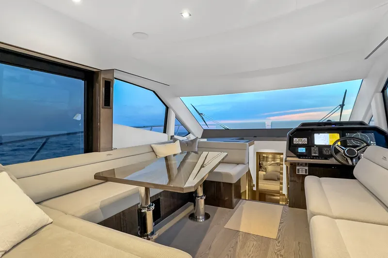 Slide: The Image of Luxurious interior of 2021 Galeon 500 Fly yacht with elegant seating and modern helm. - 15