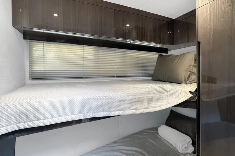 Slide: The Image of Interior cabin of 2021 Galeon 500 Fly yacht with bunk beds and modern design. - 33