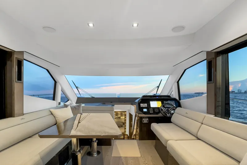 Slide: The Image of Luxurious interior of 2021 Galeon 500 Fly yacht with panoramic ocean views. - 14