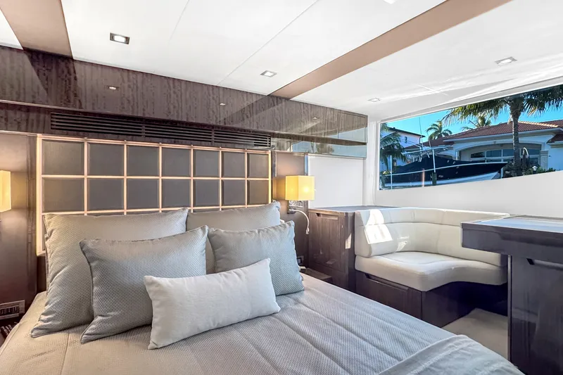 Slide: The Image of Luxurious bedroom interior of 2021 Galeon 500 Fly yacht with elegant furnishings. - 26