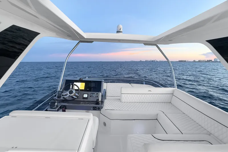 Slide: The Image of Luxurious 2021 Galeon 500 Fly yacht interior with ocean view at sunset. - 20