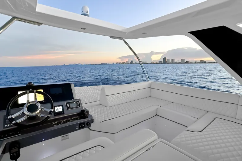 Slide: The Image of Luxurious 2021 Galeon 500 Fly yacht interior with ocean view at sunset. - 19