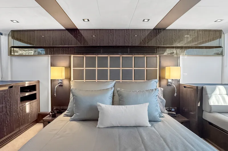Slide: The Image of Luxurious bedroom interior of 2021 Galeon 500 Fly yacht with elegant lighting and modern design. - 28
