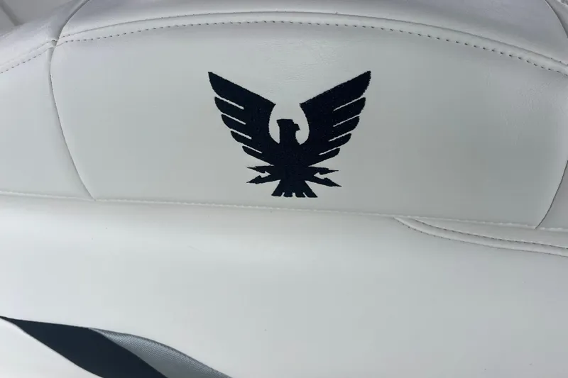 Slide: The Image of Black eagle logo on white leather seat of 2006 Formula 370 Super Sport boat. - 12