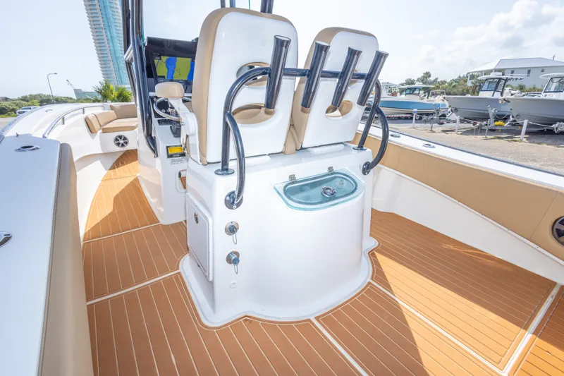 Slide: The Image of 2018 Cape Horn 27XS boat interior with modern helm and seating. - 24