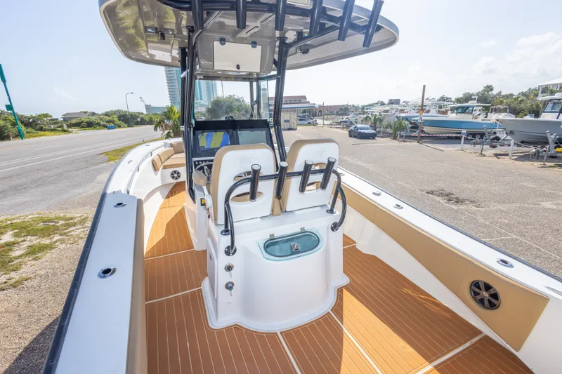 Slide: The Image of 2018 Cape Horn 27XS boat with sleek design, spacious deck, and modern console. - 23