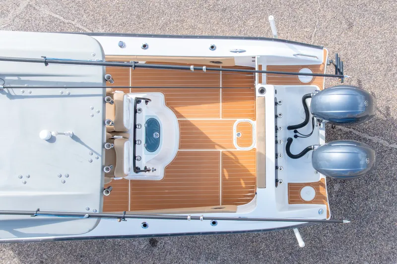 Slide: The Image of Overhead view of 2018 Cape Horn 27XS boat with dual engines and teak deck. - 10