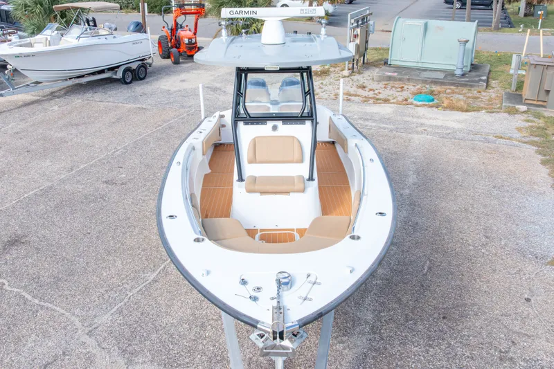 Slide: The Image of 2018 Cape Horn 27XS boat with Garmin equipment, docked on a concrete surface. - 6