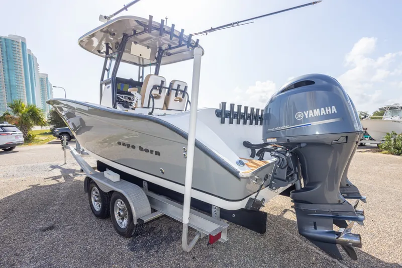 Slide: The Image of 2018 Cape Horn 27XS boat with Yamaha engine on trailer, parked outdoors. - 14