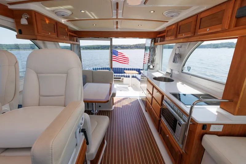 Slide: The Image of Luxurious interior of 2020 Back Cove 41 yacht with elegant seating and modern kitchen. - 2