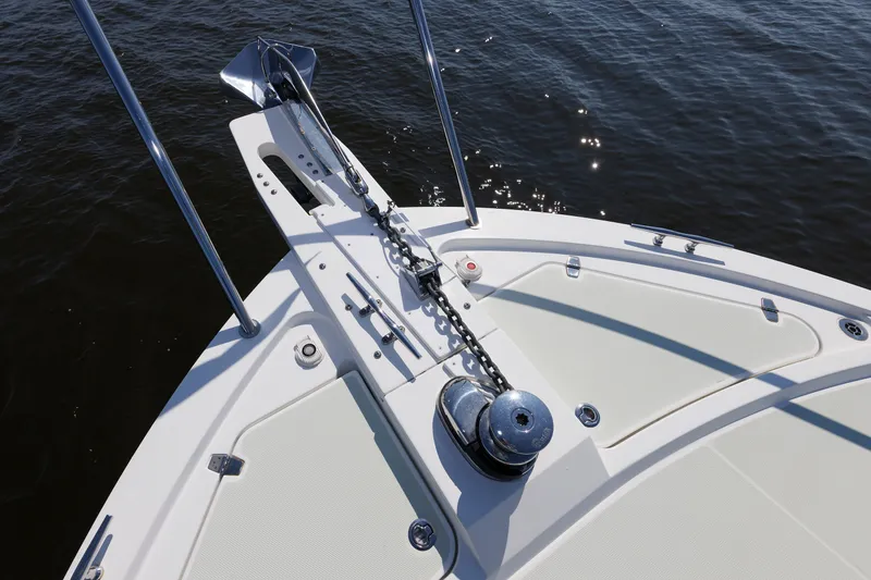 Slide: The Image of Bow of 2020 Back Cove 41 boat with anchor and chain on calm water. - 48