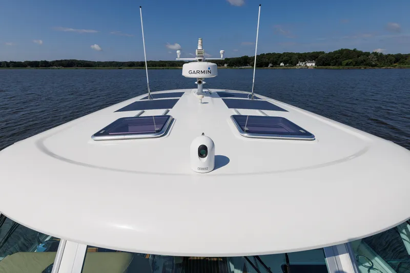 Slide: The Image of 2020 Back Cove 41 yacht with Garmin equipment on calm water. - 50