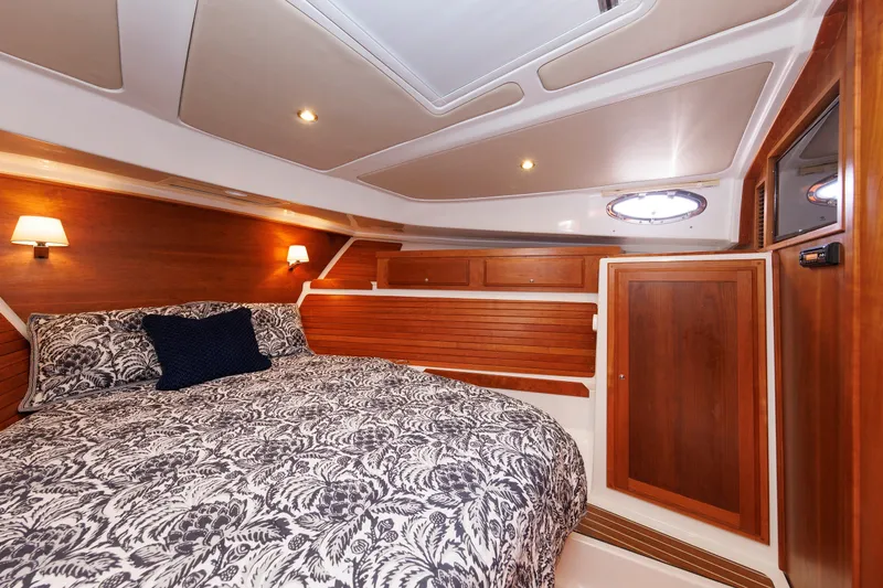 Slide: The Image of Luxurious cabin interior of 2020 Back Cove 41 yacht with elegant wood paneling. - 30