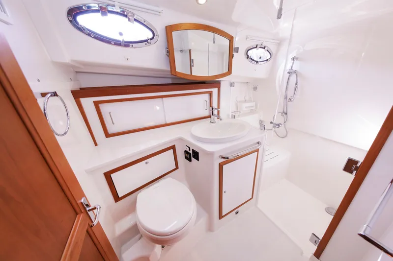 Slide: The Image of Luxurious bathroom in 2020 Back Cove 41 yacht, featuring modern fixtures and elegant wood accents. - 32