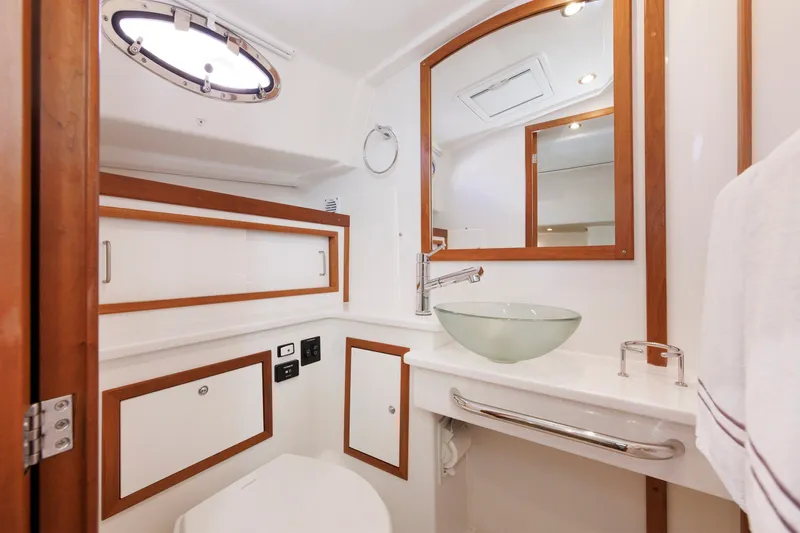 Slide: The Image of Luxurious bathroom in 2020 Back Cove 41 yacht with modern fixtures and elegant design. - 28