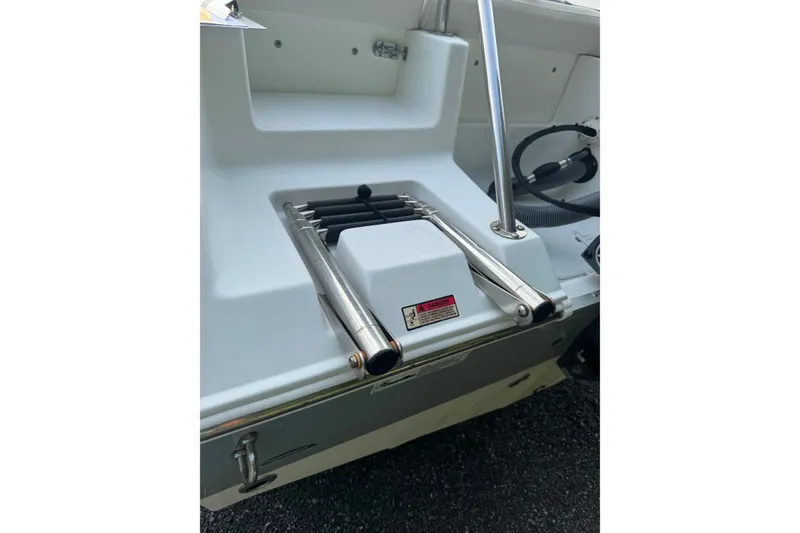 Slide: The Image of 2020 Sea Hunt Ultra 211 boat ladder and deck detail. - 6