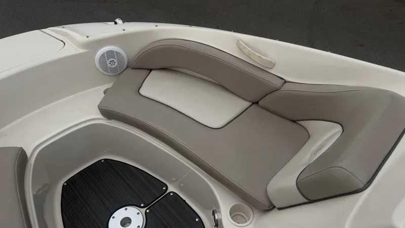 Slide: The Image of The image shows the bow area of a 2004 Sea Ray 200 Sundeck boat with cushioned seating. - 20