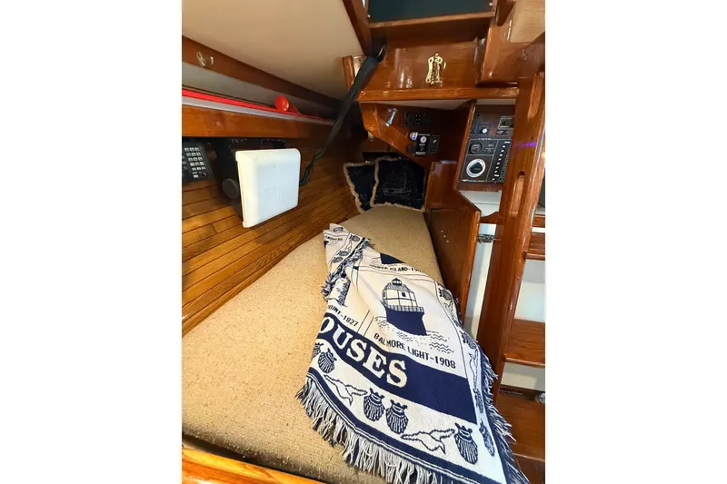 Slide: The Image of Cozy cabin interior of 1986 Cape Dory 36 sailboat with nautical decor. - 15