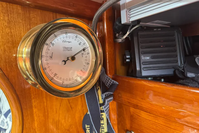 Slide: The Image of Barometer and radio equipment on 1986 Cape Dory 36 yacht interior. - 9