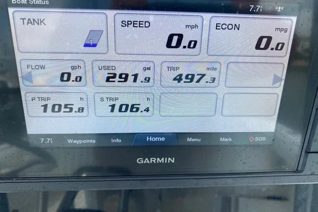 Slide: The Image of Garmin display showing boat stats: speed, fuel usage, and trip details for 2006 Regulator 23 Forward Seating. - 11
