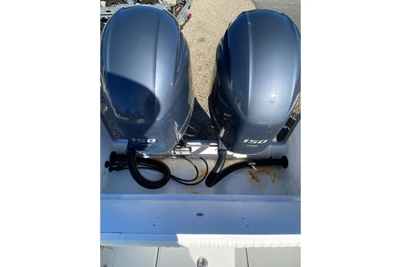 Slide: The Image of Twin Yamaha 150 outboard engines on a 2006 Regulator 23 Forward Seating boat. - 6