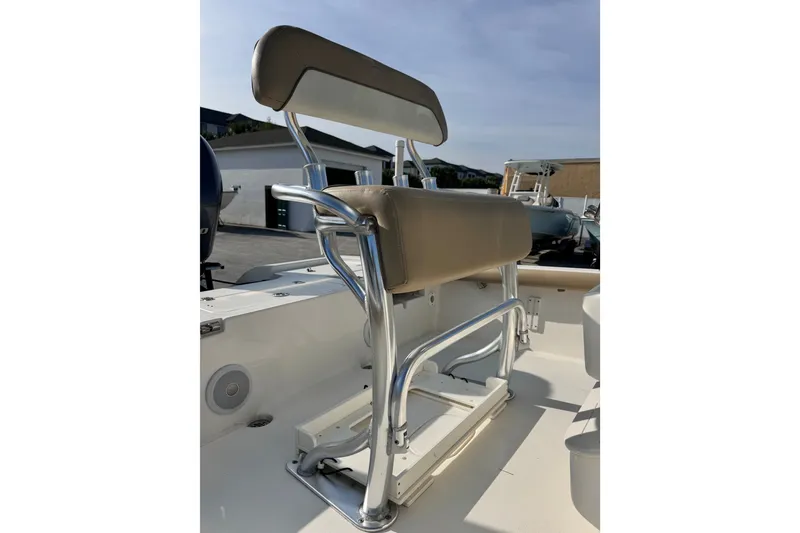 Slide: The Image of 2020 Key West 210 Bay Reef boat seat with stainless steel frame and beige upholstery. - 22