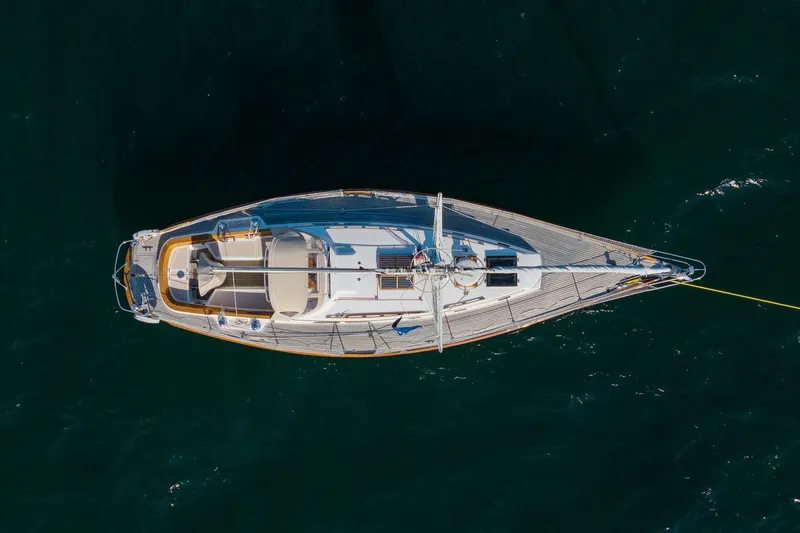 Slide: The Image of Aerial view of 1995 Hinckley Sou'wester 42 MKII sailboat on calm water. - 5