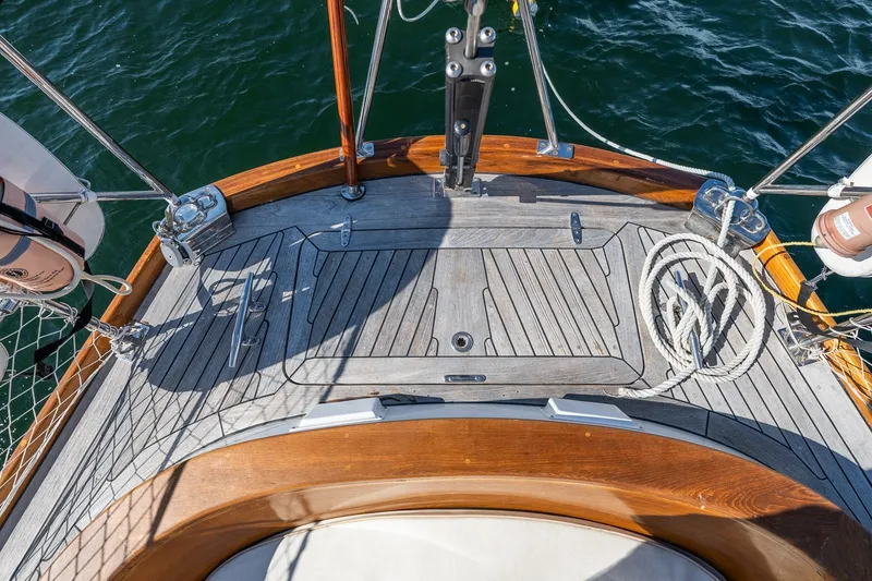 Slide: The Image of Hinckley Sou'wester 42 MKII 1995 sailboat deck with teak finish and nautical ropes. - 39