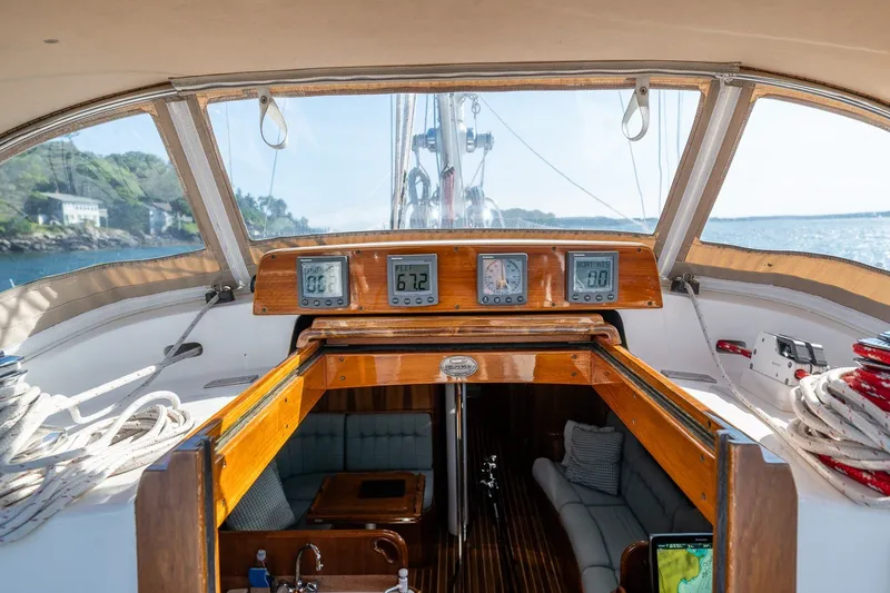 Slide: The Image of Interior view of 1995 Hinckley Sou'wester 42 MKII sailboat cockpit with navigation instruments. - 60