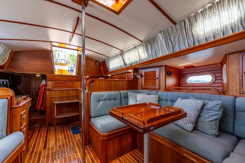 Slide: The Image of Interior of 1995 Hinckley Sou'wester 42 MKII sailboat with elegant wood finish and cozy seating. - 29