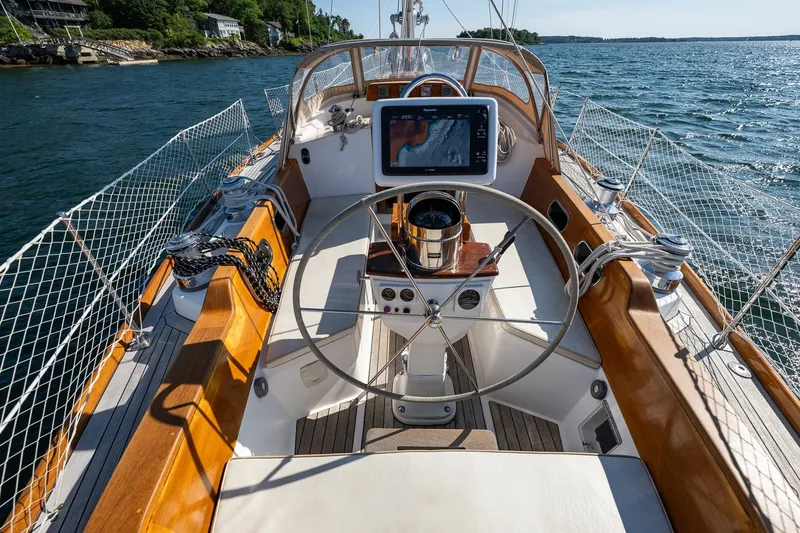 Slide: The Image of Cockpit of 1995 Hinckley Sou'wester 42 MKII sailboat with wooden accents and steering wheel. - 40