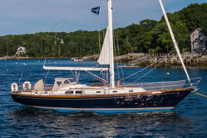 Slide: The Image of Hinckley Sou'wester 42 MKII sailboat, 1995 model, anchored in scenic coastal waters. - 8