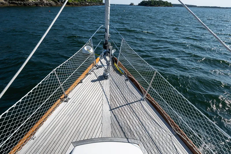 Slide: The Image of Hinckley Sou'wester 42 MKII sailboat deck, 1995 model, cruising on open water. - 48