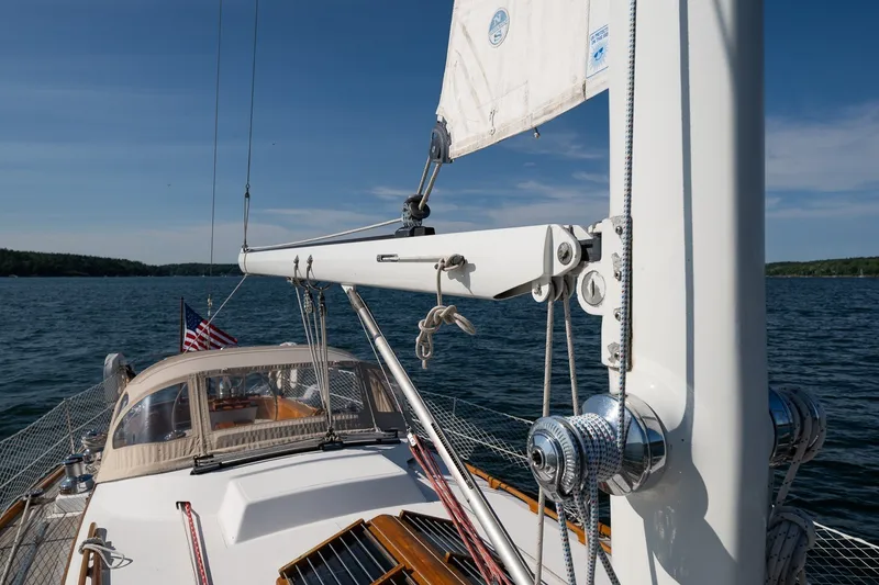 Slide: The Image of Hinckley Sou'wester 42 MKII sailboat, 1995 model, sailing on a clear blue sea. - 55