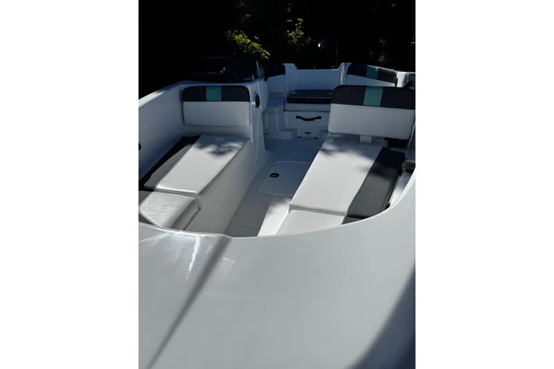 Slide: The Image of 2026 Tahoe T16 boat interior with sleek seating and modern design. - 13