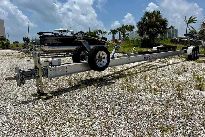 Slide: The Image of 2020 Intrepid 407 Cuddy boat on trailer in outdoor storage area. - 23