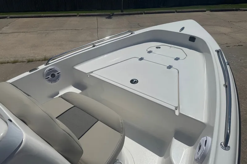 Slide: The Image of 2027 Key West 1720 Center Console boat interior with seating and storage compartments. - 17