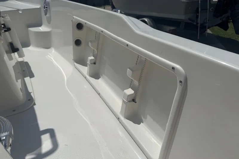 Slide: The Image of 2027 Key West 1720 Center Console boat interior with storage compartments. - 18