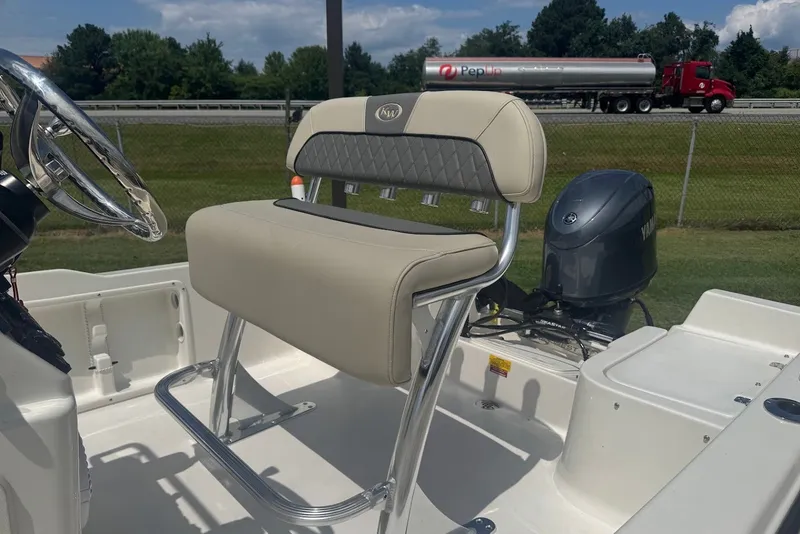 Slide: The Image of 2027 Key West 1720 Center Console boat with Yamaha engine and comfortable seating. - 8