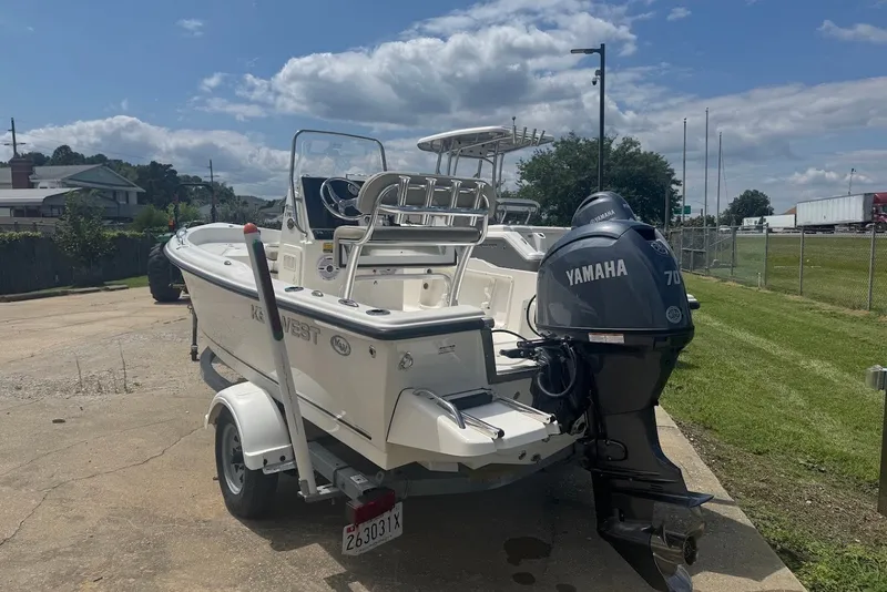 Slide: The Image of 2027 Key West 1720 Center Console boat with Yamaha motor on trailer, parked outdoors. - 3