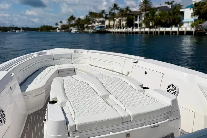 Slide: The Image of Luxurious 2023 Intrepid 427 Nomad FE boat interior with white seating on a sunny day. - 21