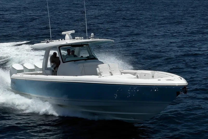 The Image of 2023 Intrepid 427 Nomad FE cruising on open water, showcasing sleek design and performance. - 0