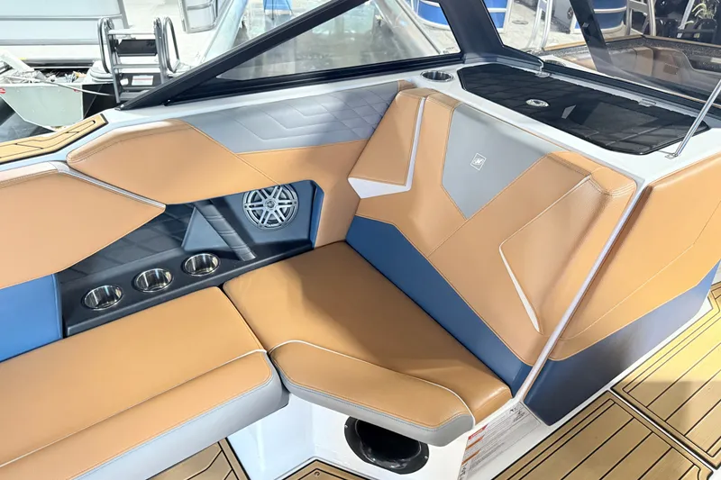 Slide: The Image of Luxurious interior seating of 2022 Nautique Super Air Nautique S23 boat. - 18