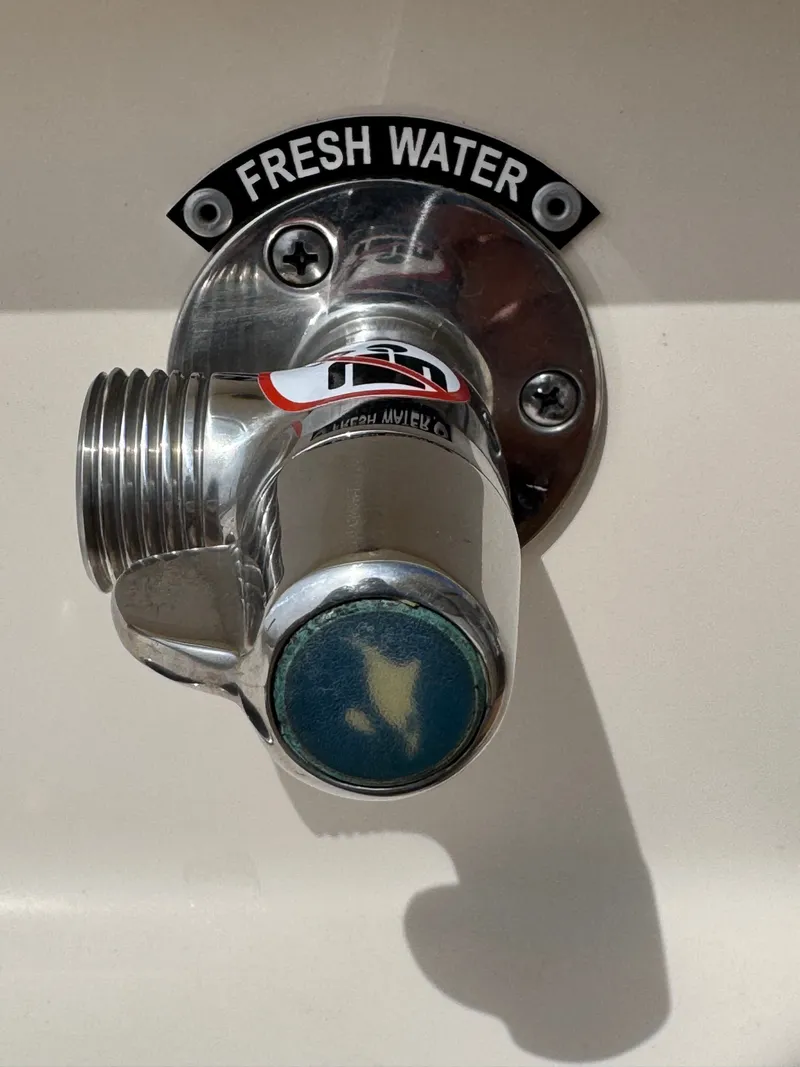 Slide: The Image of Fresh water connection on a 2016 Grady-White Canyon 336 boat. - 25