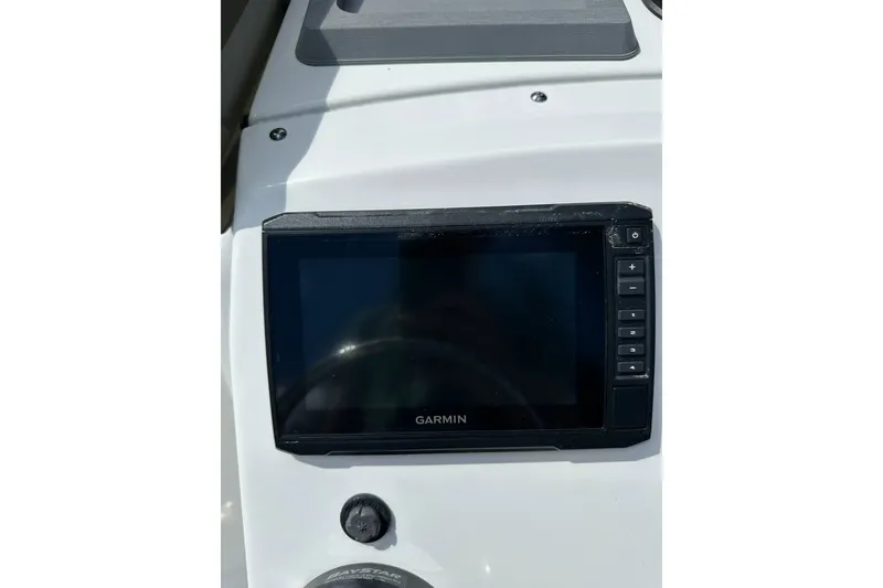 Slide: The Image of Garmin navigation system on 2021 Edgewater 170CC boat dashboard. - 8