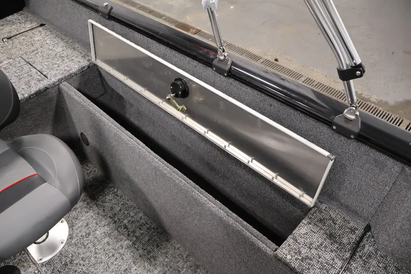 Slide: The Image of 2025 Tracker Pro Guide V-175 WT boat interior with storage compartment and seating. - 37